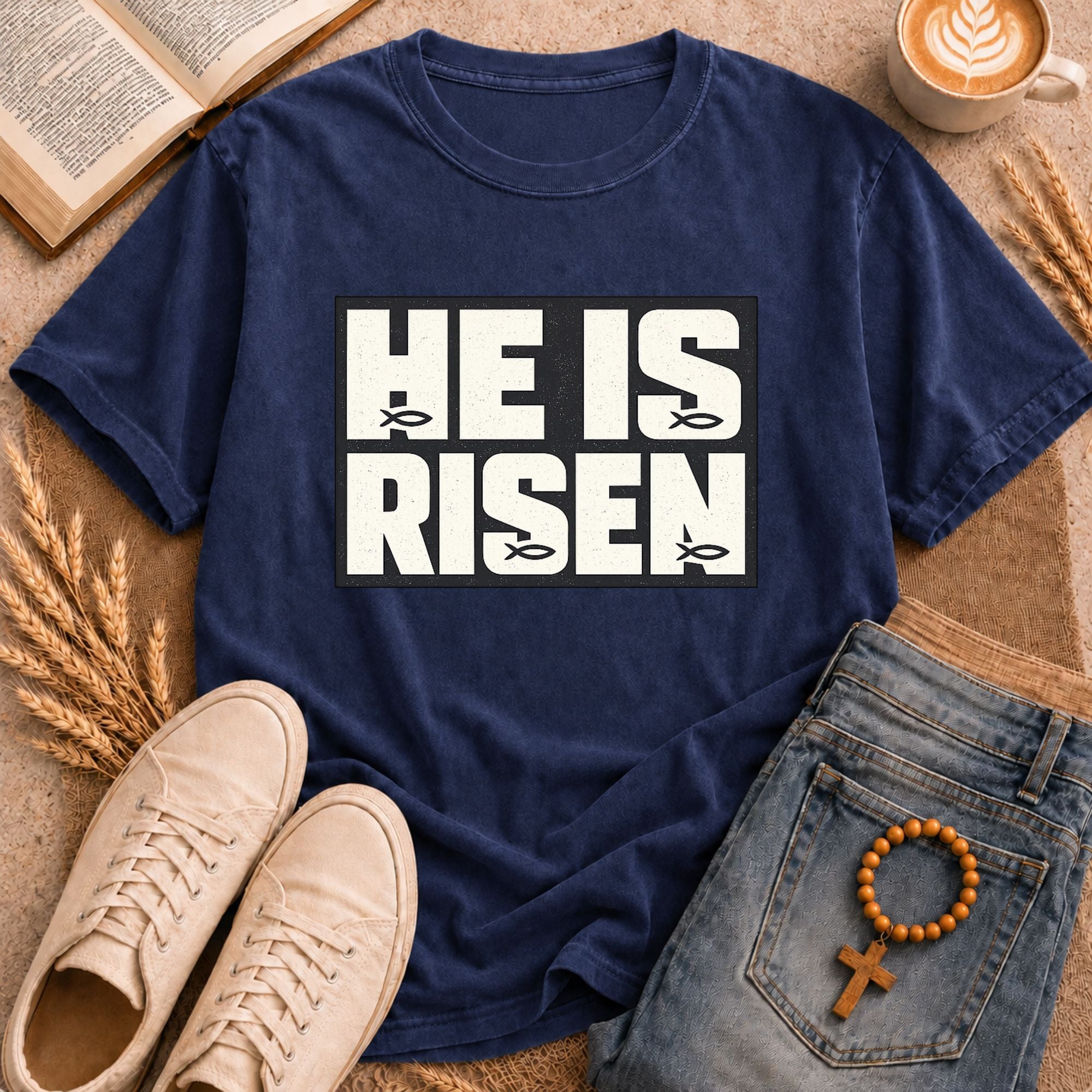 He Is Risen Christian Easter graphic tee bold framed text butterfly detail scripture design