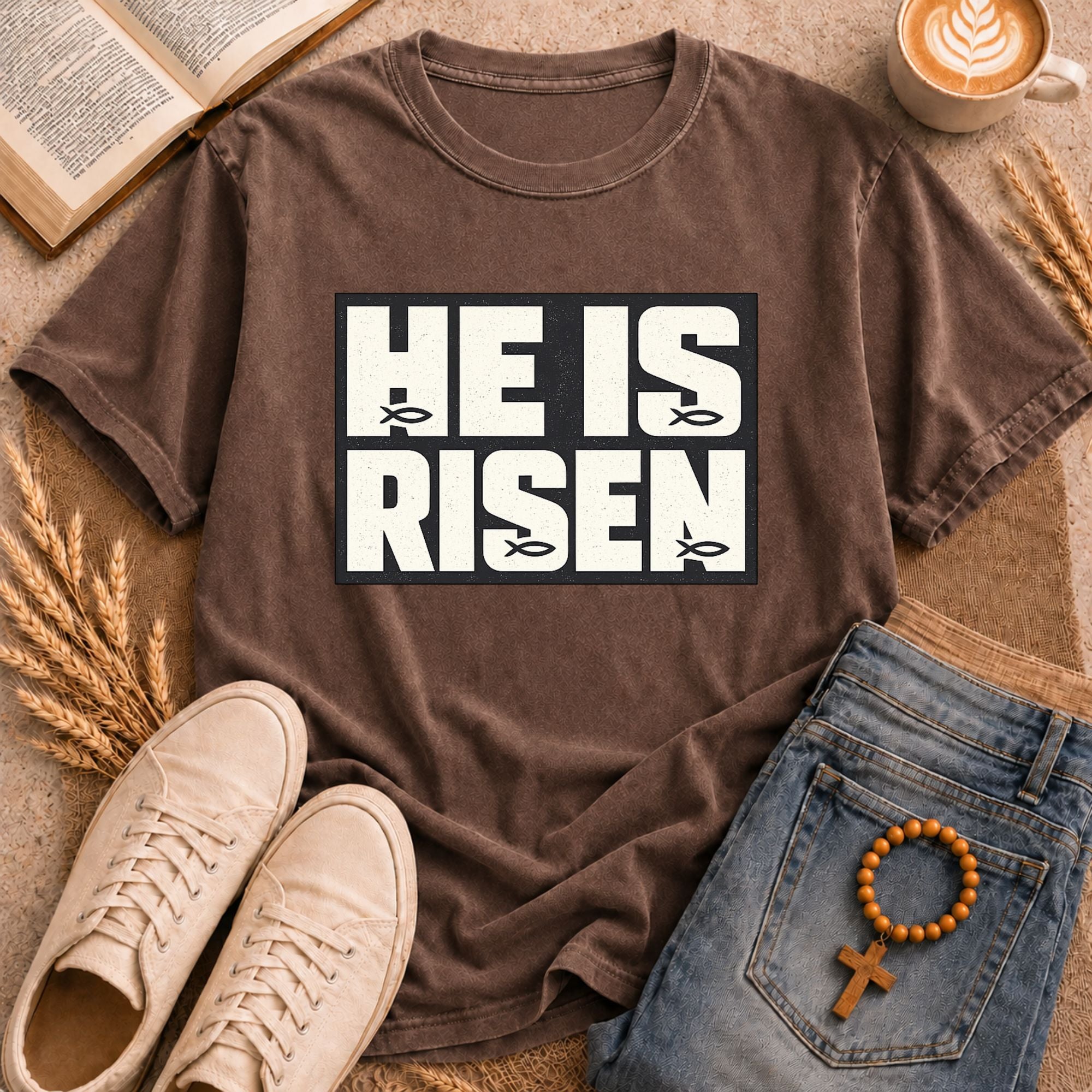 He Is Risen Christian Easter graphic tee bold framed text butterfly detail scripture design